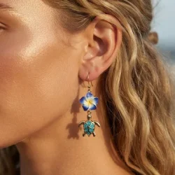 Boucles oreilles fleur tropicale tortue dorée résine