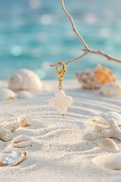 charms-trefle-nacre-blanc-en-acier-inoxydable-elegance-intemporelle_ecru_6a40389530246.jpg